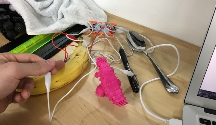 the makey makey connected to a banana