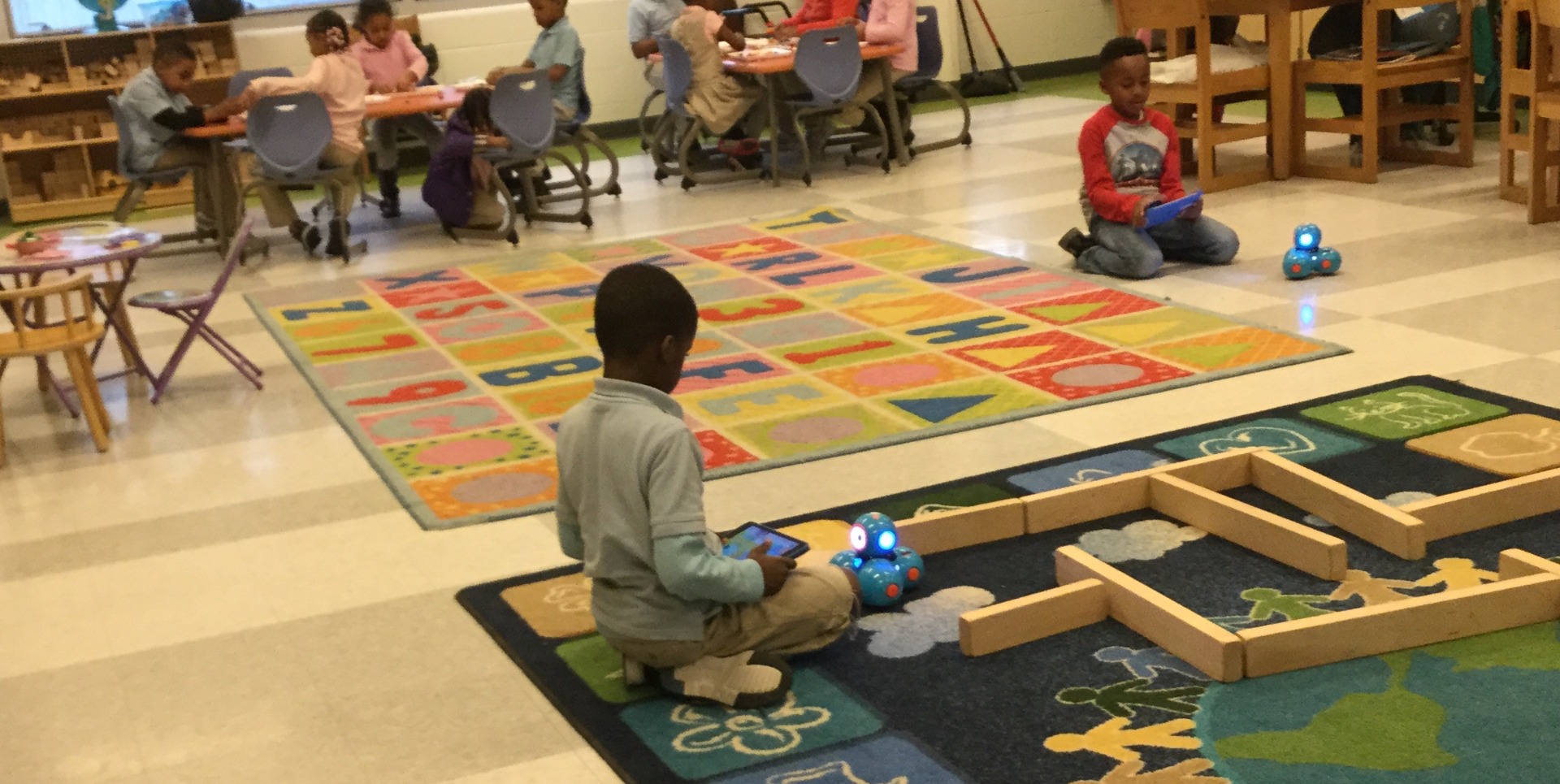 students coding with the dash robot