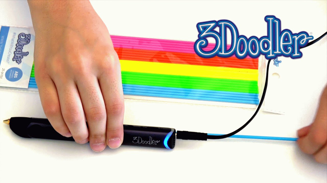 the 3doodler create+ 3d printing pen placed next to a pack of 3doodler 3d printing filament