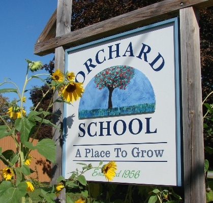 a sign outside the orchard school in burlington, vt