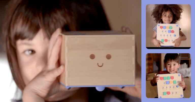 a toddler using the Cubetto robot for STEM in early childhood education