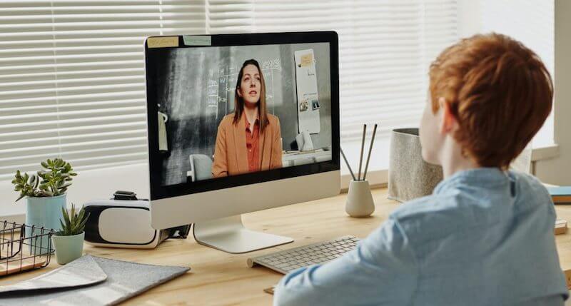 student having a social-emotional check-in with teacher virtually