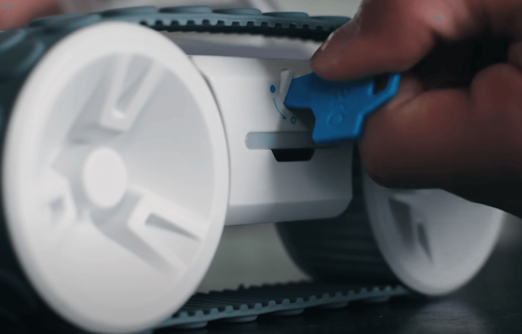 opening the sphero rvr battery compartment with the included key