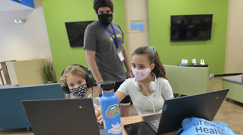 students in masks staying safe as they return to in-person learning
