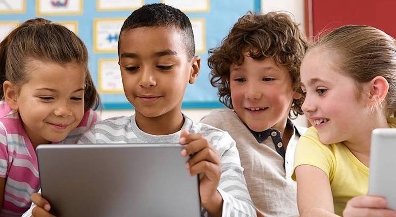 students using EdTech tools in the classroom