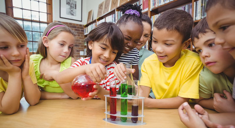 a group of students working on a STEM project and building a connection in the classroom