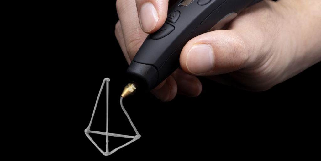 the 3doodler pro+ 3d printing pen being used to create a 3D design