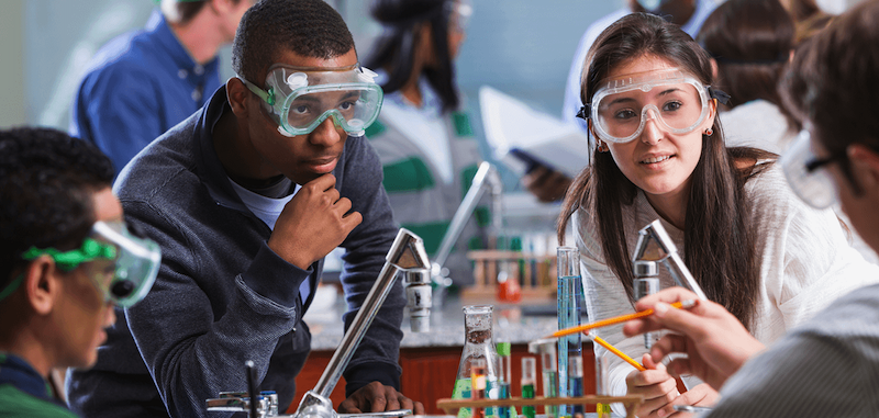 STEM majors work on an experiment in college