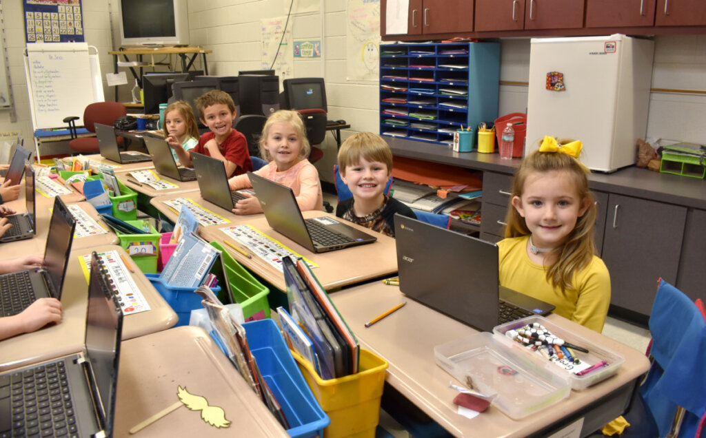 early elementary students using chromebooks in the classroom