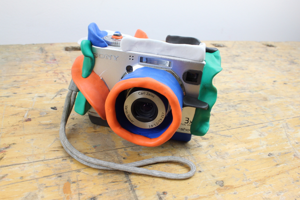 a camera with protective sugru coating