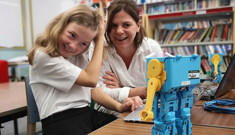 students using the marty v2 coding robot in middle school