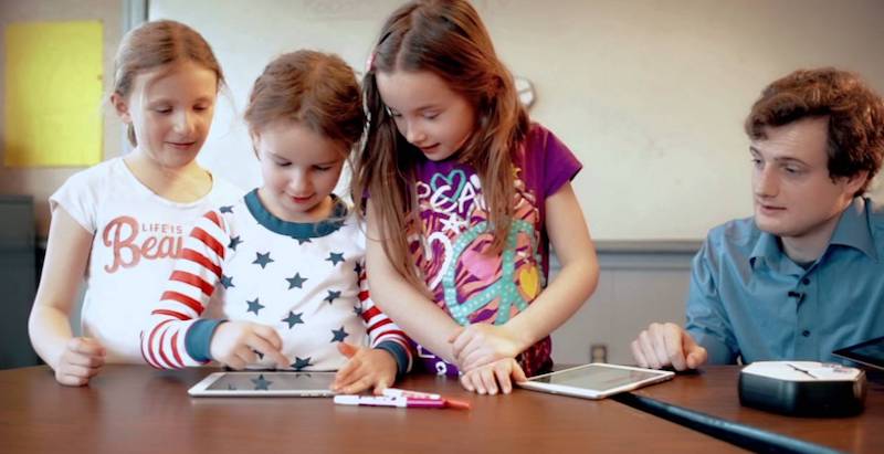 students using one of the best educational coding robots, the root from irobot education