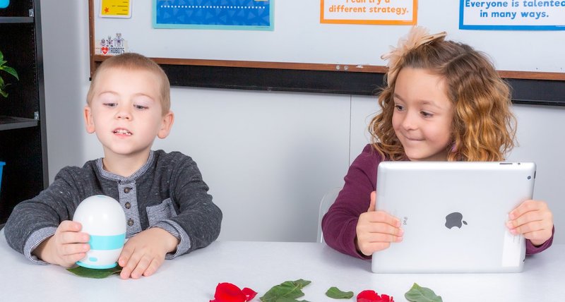 young children using technology for hands-on learning in a STEM enrichment program