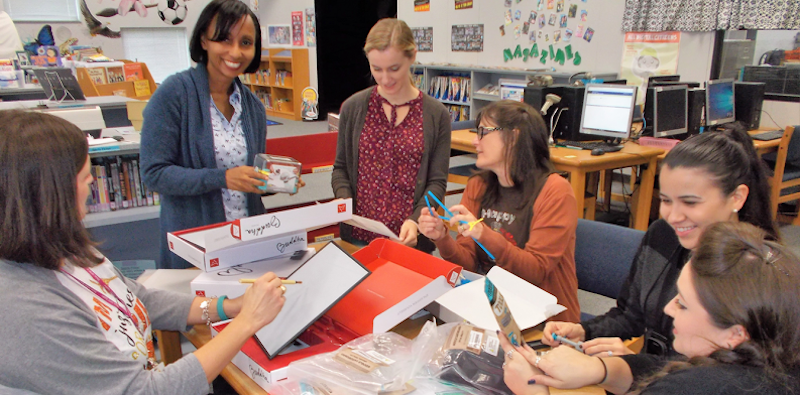 students working on a collaborative project in a school makerspace