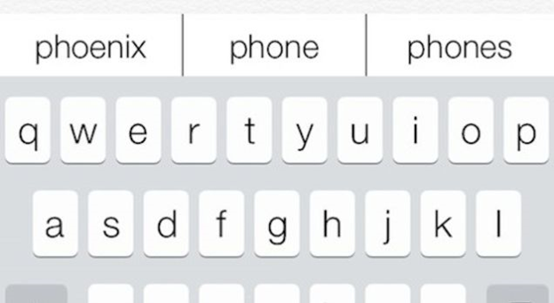 the keyboard of an iPhone with texting suggestions