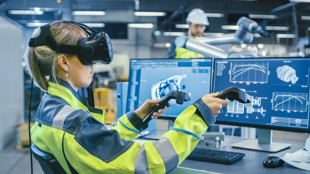 a woman wearing a virtual reality headset while working in a STEM career